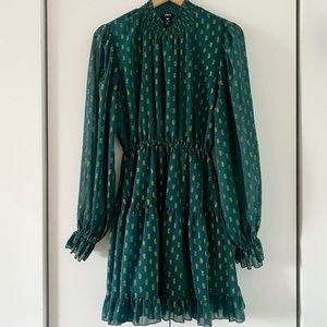 Aqua Mock High Neck Ruffled Dress in Green muslin with Metallic gold details.